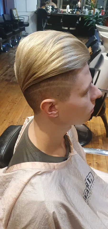 Hair colour, after: blonde with lines cut into the undercut, side view