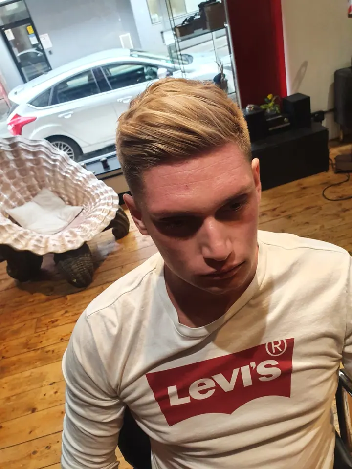 Blonde side-parted quiff, three-quarter view